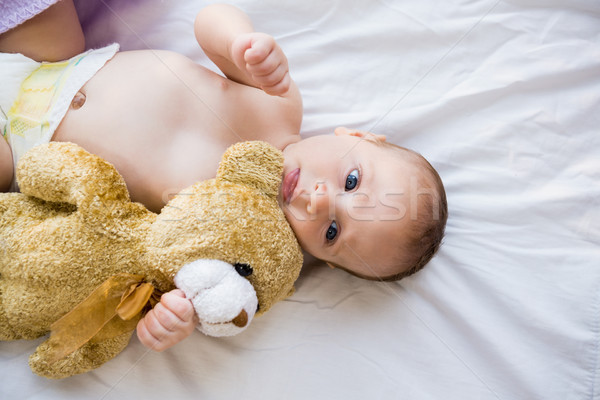 Baby lying on baby bed Stock photo © wavebreak_media