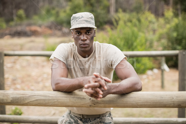Military man standing during obstacle course in boot camp Stock photo © wavebreak_media