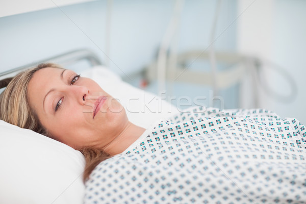 Female patient looking at camera in hospital ward Stock photo © wavebreak_media