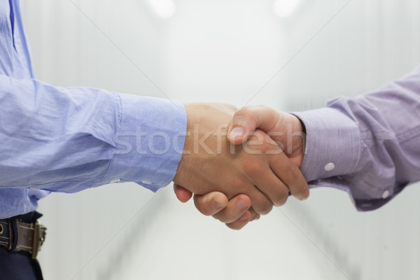 Two men shaking hands in data center Stock photo © wavebreak_media