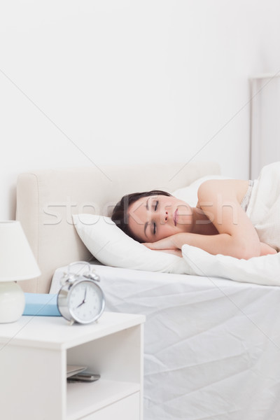 Beautiful woman sleeping in bed Stock photo © wavebreak_media