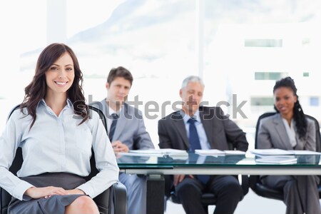 Smiling businesswoman giving a handshake  Stock photo © wavebreak_media