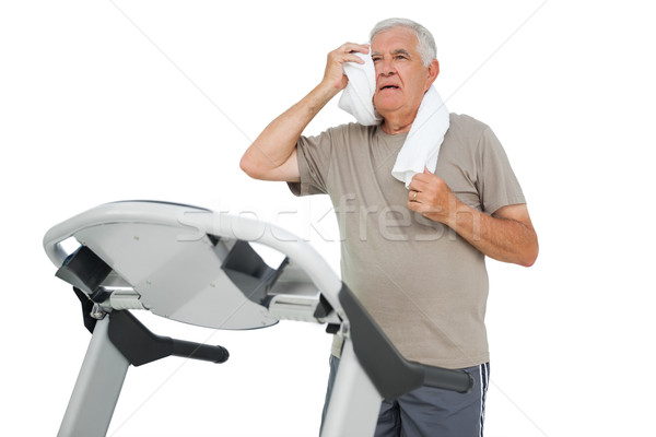 Tired senior man running on a treadmill Stock photo © wavebreak_media