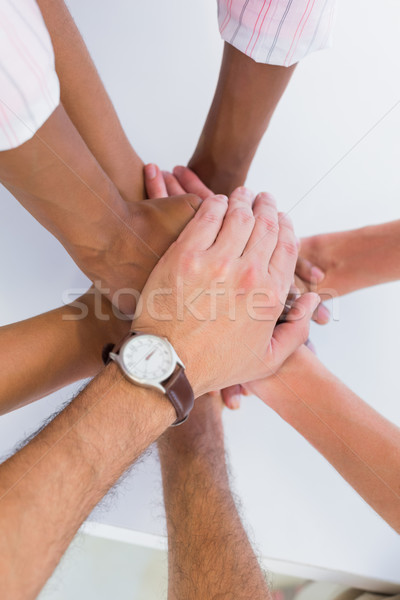 Equipo manos junto oficina hombre profesional Foto stock © wavebreak_media