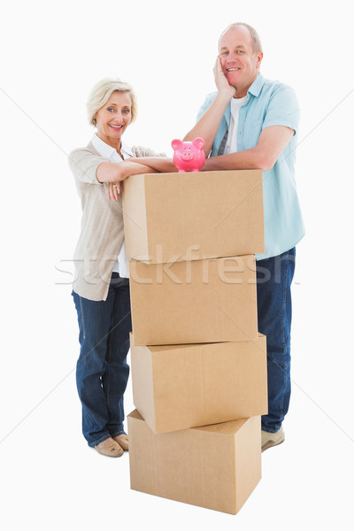 Idősebb pár mosolyog kamera költözködő dobozok persely Stock fotó © wavebreak_media