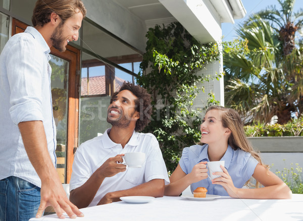 Heureux amis café ensemble à l'extérieur café [[stock_photo]] © wavebreak_media