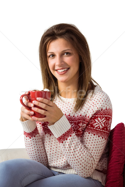 Heureux jeune femme séance canapé mug Photo stock © wavebreak_media