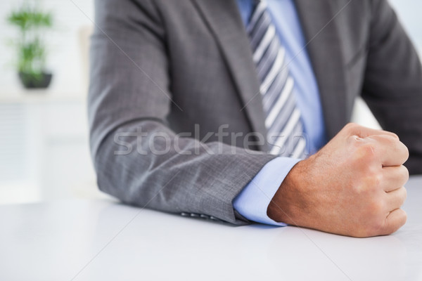 Angry businessman banging his fist Stock photo © wavebreak_media