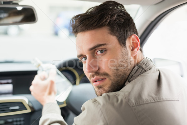 Man drinking alcohol while driving Stock photo © wavebreak_media