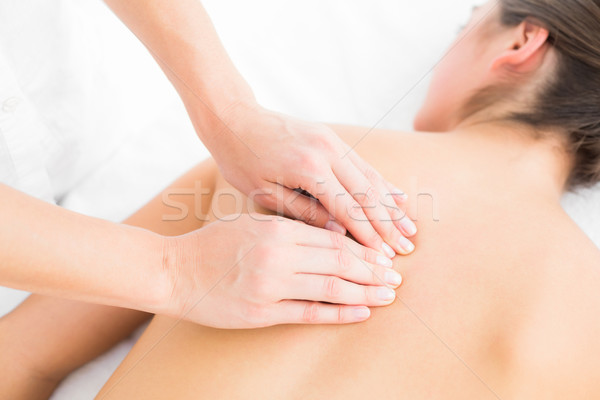 Hübsche Frau genießen zurück Massage Frau Stock foto © wavebreak_media