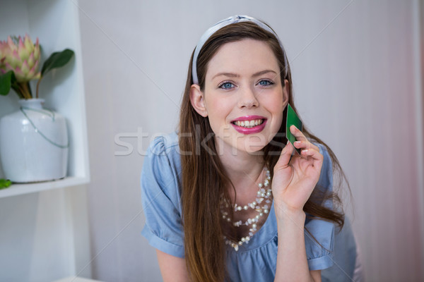 Morena cartão de crédito moda boutique feminino sorridente Foto stock © wavebreak_media