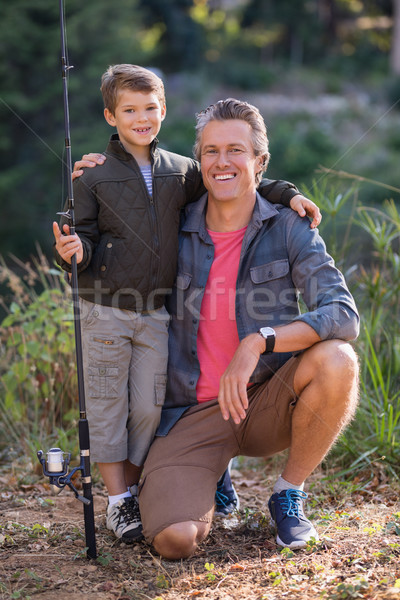 Vader zoon poseren hengel veld portret boom Stockfoto © wavebreak_media