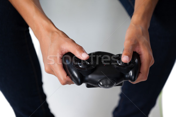 Nő játszik videojáték fehér középső rész technológia Stock fotó © wavebreak_media