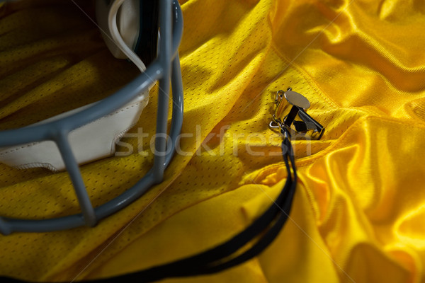 American football jersey, referee whistle and head gear Stock photo © wavebreak_media