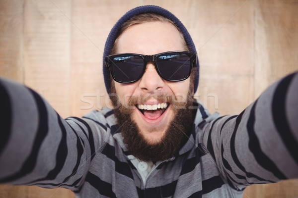 Portrait heureux lunettes de soleil bois [[stock_photo]] © wavebreak_media