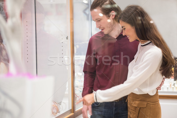 Happy couple shopping in jeweler shop Stock photo © wavebreak_media