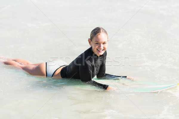 Feliz mulher prancha de surfe mar oceano feminino Foto stock © wavebreak_media
