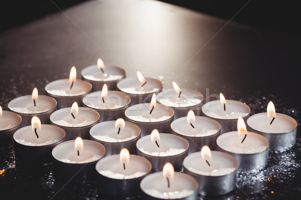 Candles burning during christmas Stock photo © wavebreak_media
