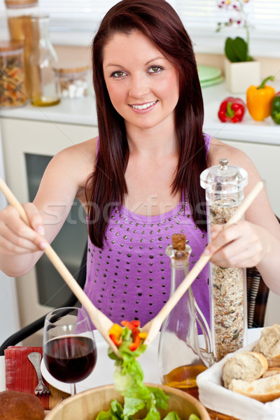 Cute woman eating her healthy meal at home in the kitchen Stock photo © wavebreak_media