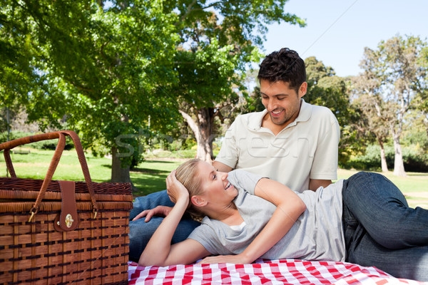Stock photo: Lovers picnicking in the park
