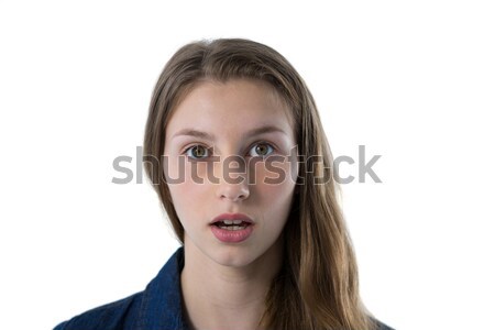 Young girl asking for silence against a white background Stock photo © wavebreak_media