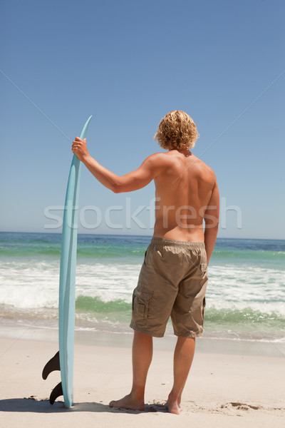 Młodych człowiek deska surfingowa ocean Zdjęcia stock © wavebreak_media