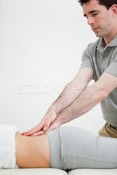 Close-up of a masseur massaging the back of a woman in a room Stock photo © wavebreak_media