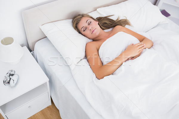 Mujer dormir blanco dormitorio femenino caucásico Foto stock © wavebreak_media