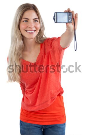 Portrait of happy female with photographic camera Stock photo © wavebreak_media