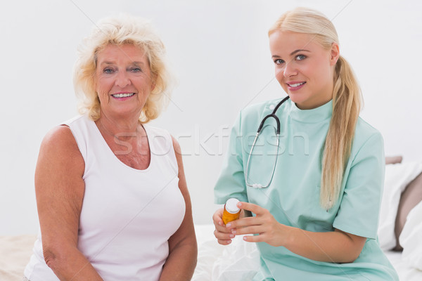 Stock photo: Home nurse and patient posing 