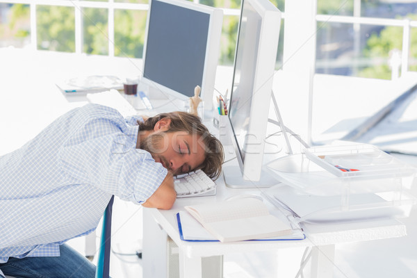 Man Asleep At His Desk Stock Photo C Wavebreak Media Ltd