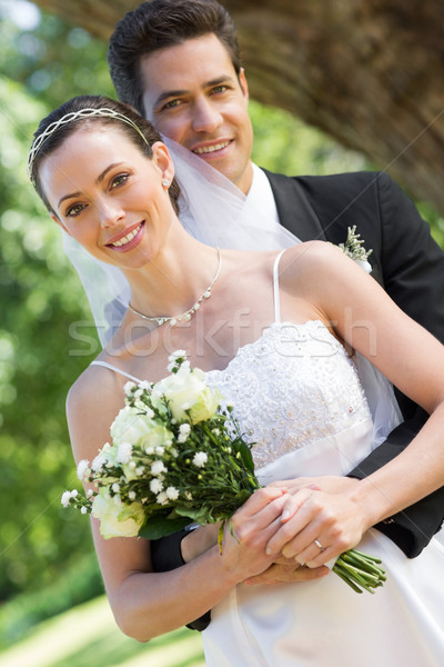 Affectueux marié mariée derrière jardin [[stock_photo]] © wavebreak_media