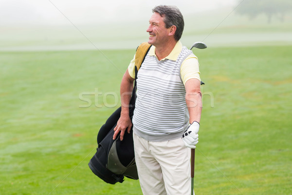 Сток-фото: красивый · гольфист · Постоянный · сумка · для · гольфа · туманный · день