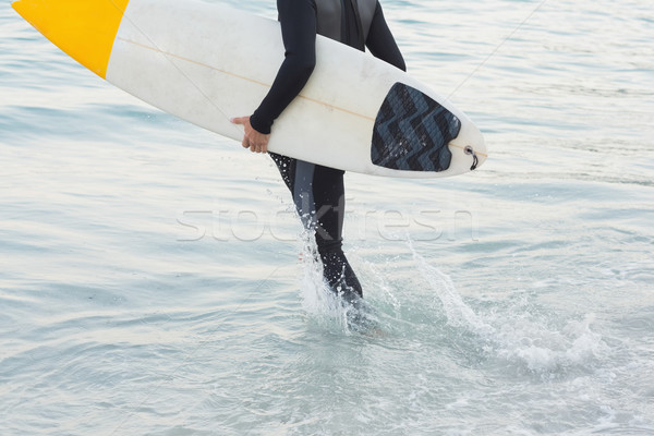 Homem prancha de surfe praia esportes mar Foto stock © wavebreak_media