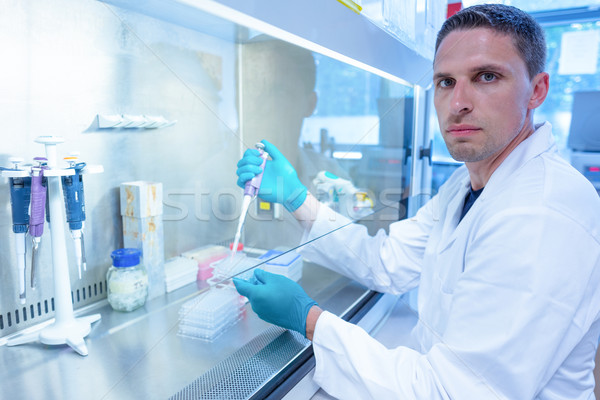 Science student using pipette in the lab Stock photo © wavebreak_media