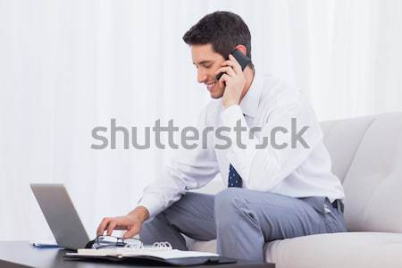 Biznesmen połączenia biuro telefonu szczęśliwy Zdjęcia stock © wavebreak_media