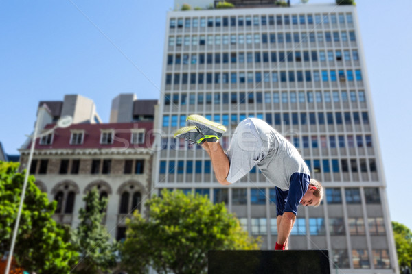  Man doing parkour in the city Stock photo © wavebreak_media