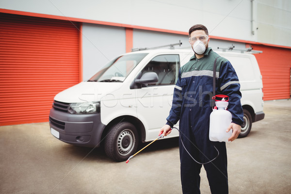 Handyman with insecticide standing Stock photo © wavebreak_media