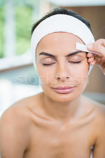 Femeie faţă ceruire spa Imagine de stoc © wavebreak_media