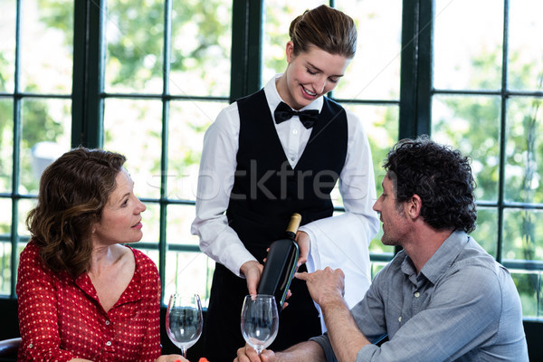 Couple selecting a bottle of wine Stock photo © wavebreak_media