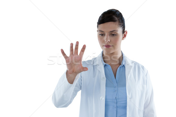 Beautiful female doctor using digital screen Stock photo © wavebreak_media