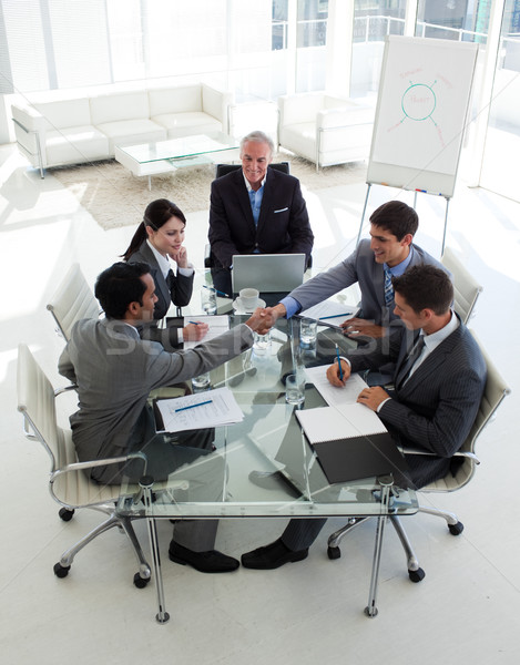 Businessmen closing a deal in a meeting Stock photo © wavebreak_media