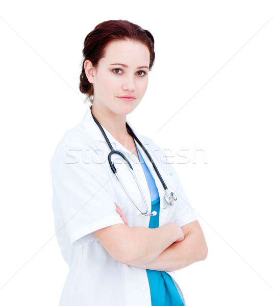 Stock photo: Portrait of a charismatic female doctor with folded arms