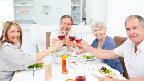 Stock photo: Retired friends toasting together