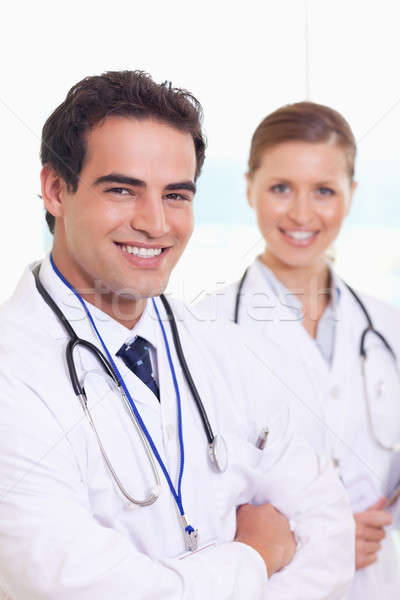 Smiling young medical team standing next to each other Stock photo © wavebreak_media