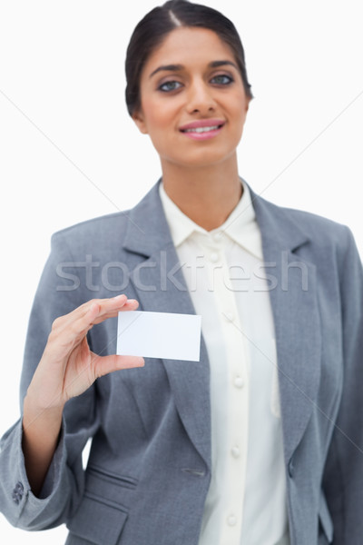 Tradeswoman showing blank business card against a white background Stock photo © wavebreak_media