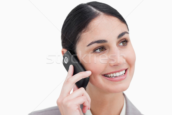 Close up of businesswoman on her cellphone against a white background Stock photo © wavebreak_media