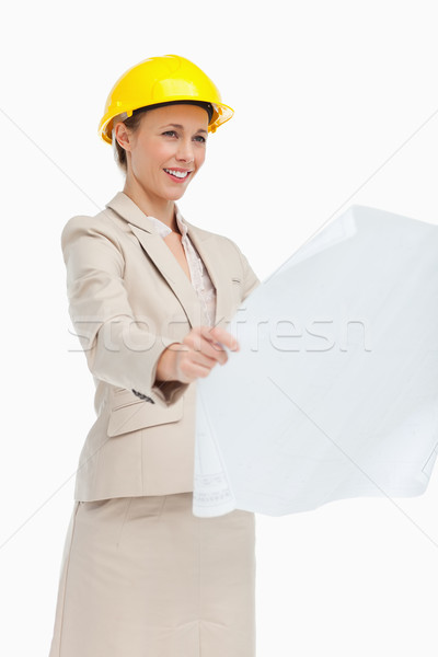 Mujer traje mirando planes blanco negocios Foto stock © wavebreak_media