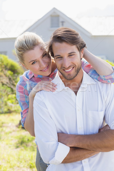 [[stock_photo]]: Cute · couple · souriant · caméra · ensemble · jardin