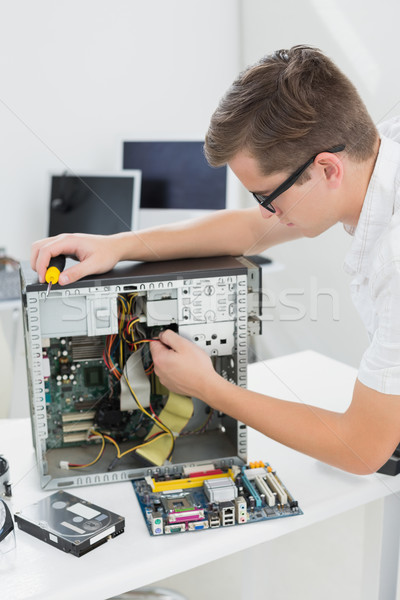 Jungen Techniker arbeiten defekt Computer Büro Stock foto © wavebreak_media